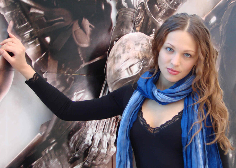 woman in blue scarf at event