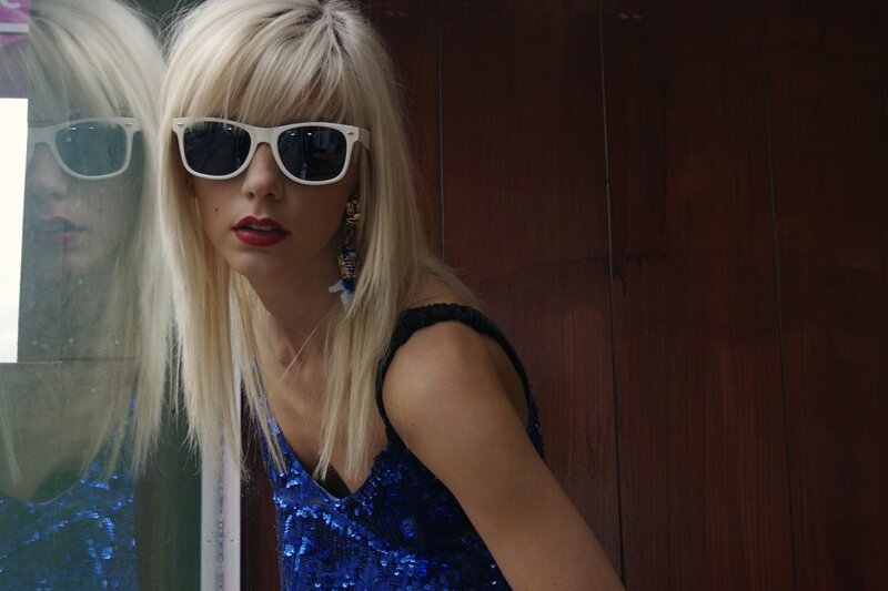 woman in blue sequin dress