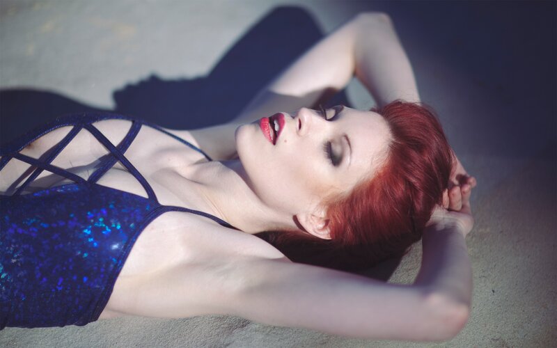 woman in blue sequin top