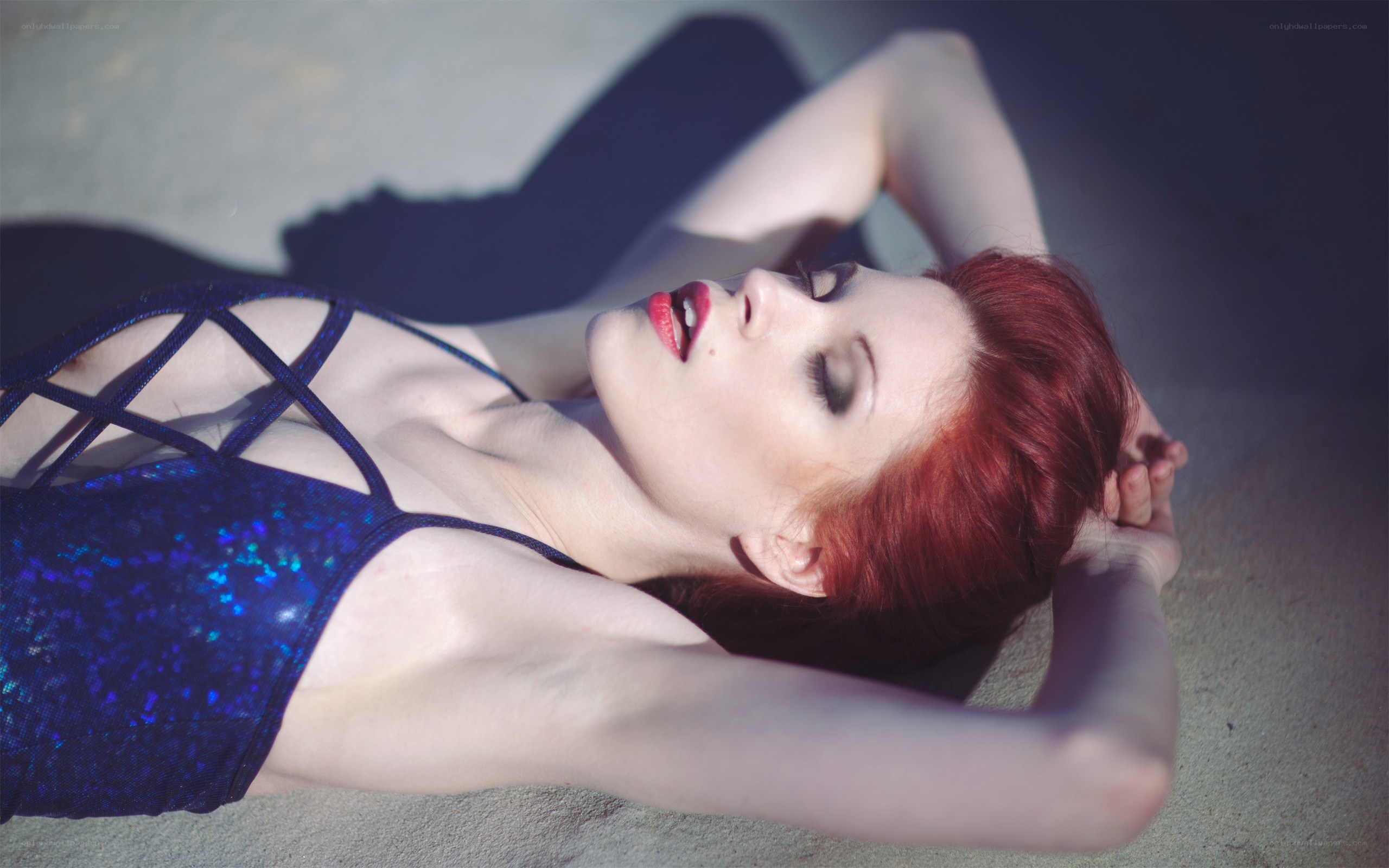 woman in blue sequin top