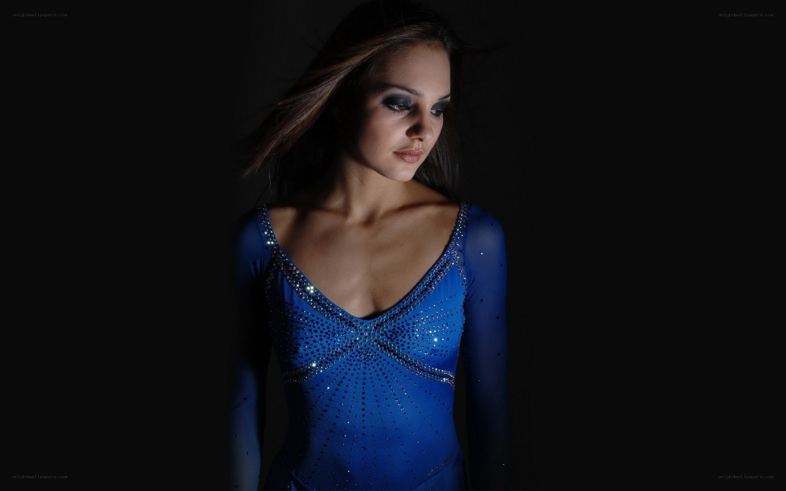 woman in blue sequined dress