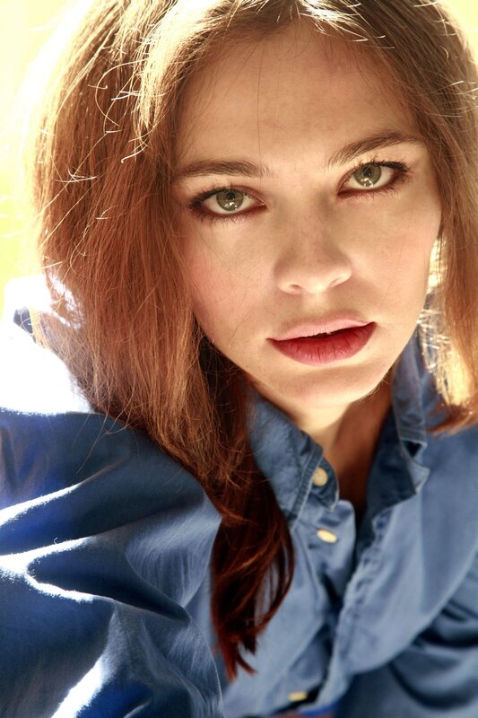 woman in blue shirt