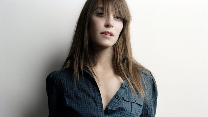 woman in blue shirt