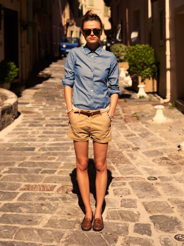 woman in blue shirt and shorts