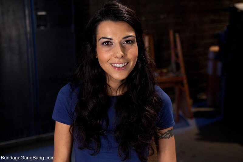 woman in blue shirt smiling