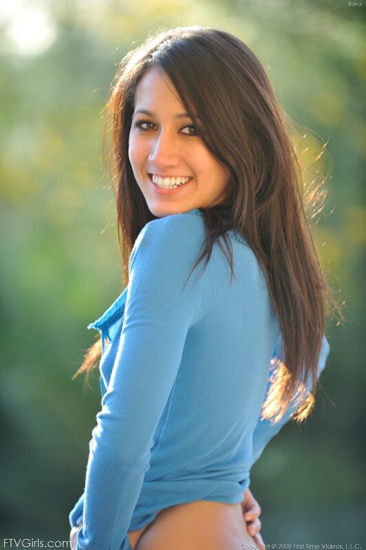 woman in blue shirt smiling