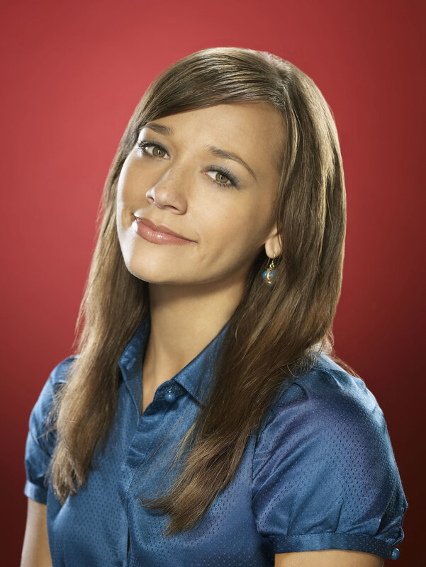 woman in blue shirt smiling