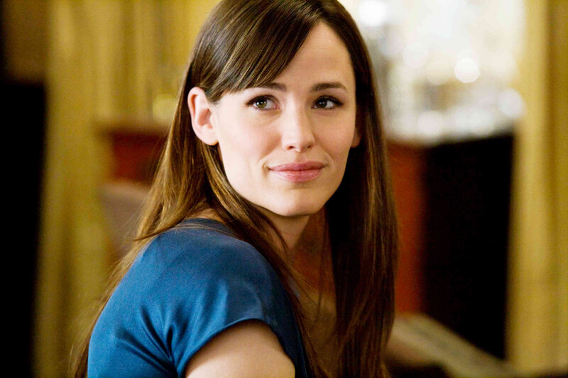 woman in blue shirt smiling