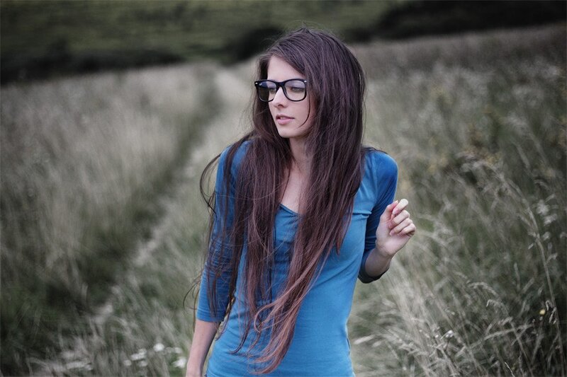 woman in blue shirt walking