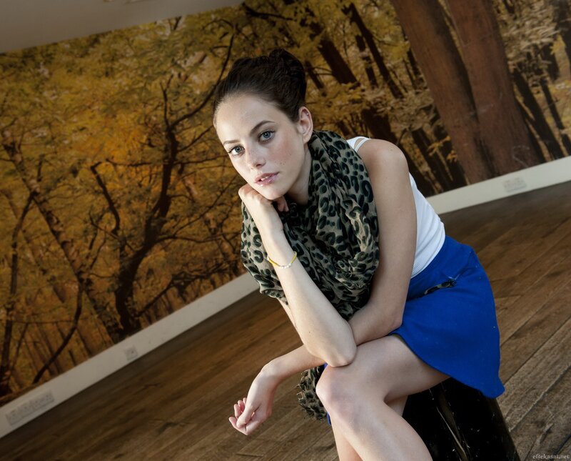woman in blue skirt posing
