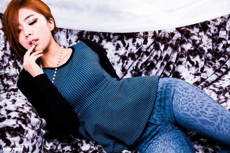 woman in blue striped top