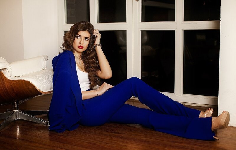 Woman in Blue Suit — Dramatic, Night, Photograph