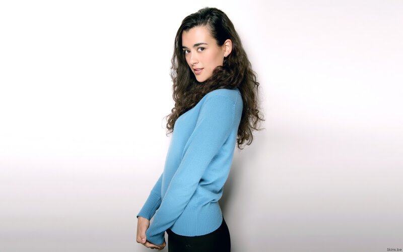 woman in blue sweater