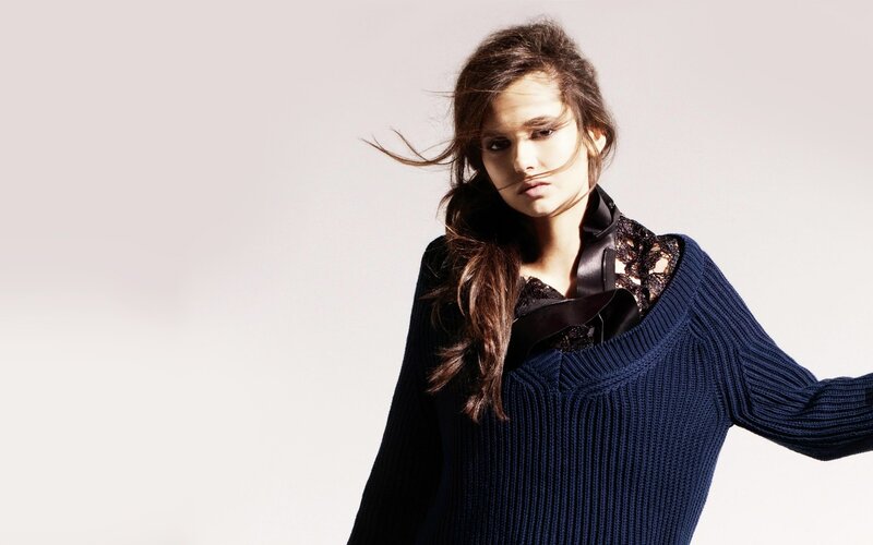 woman in blue sweater
