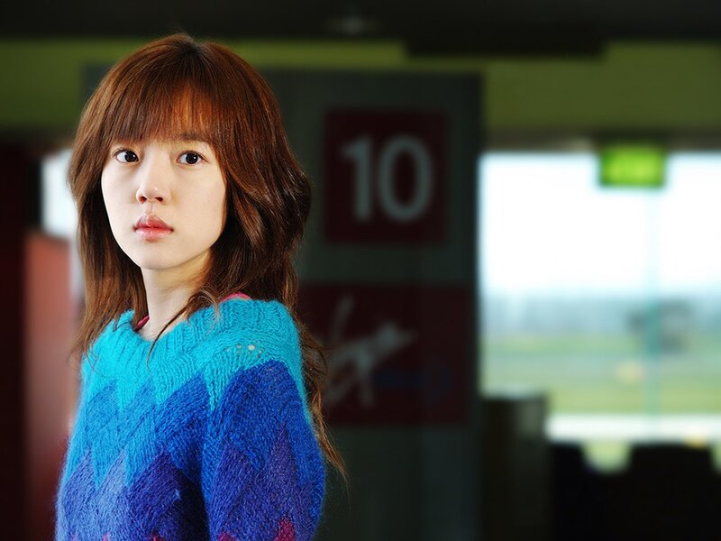 woman in blue sweater