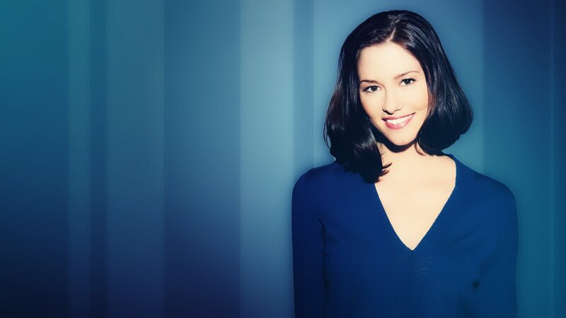 woman in blue sweater