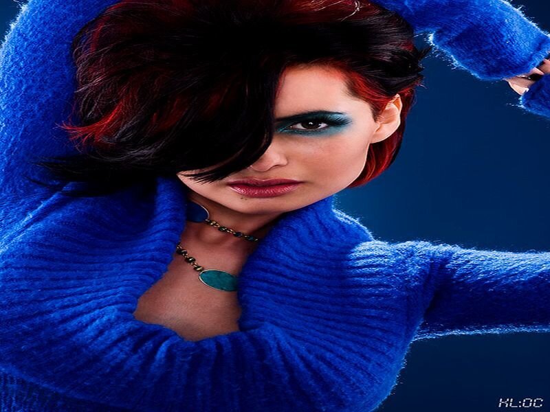 Woman in Blue Sweater — Dramatic