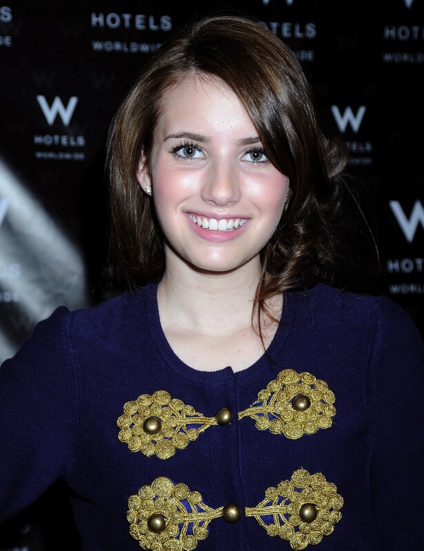 woman in blue sweater smiling