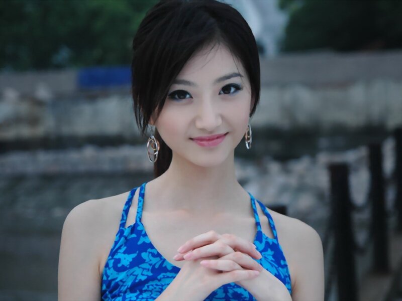 woman in blue swimsuit