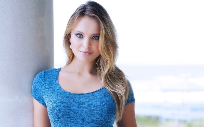 woman in blue top