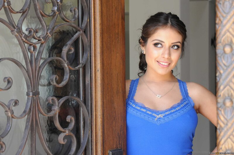 woman in blue top at door