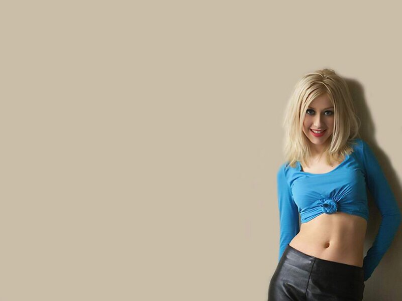 woman in blue top leaning