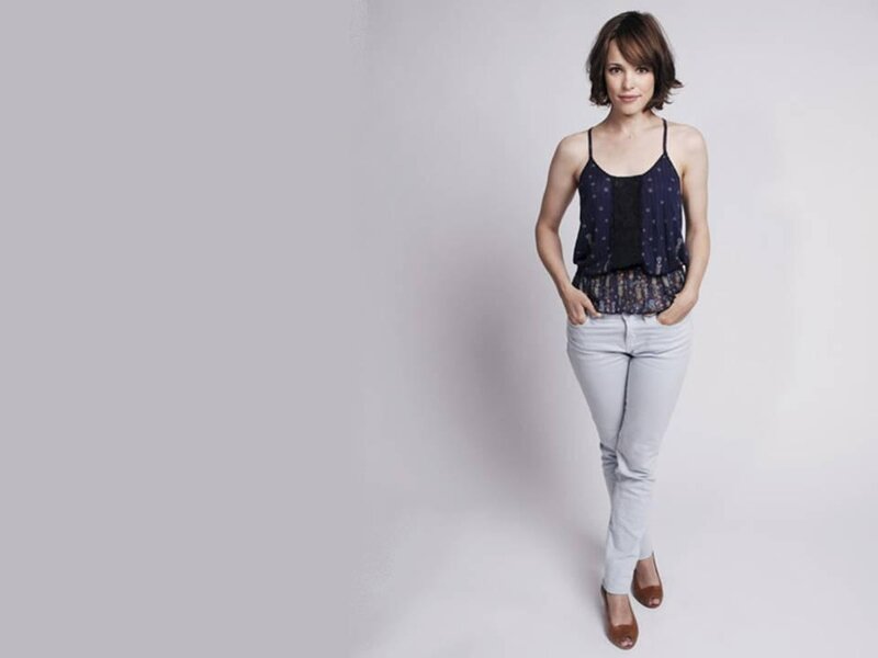 Woman in Blue Top — Neutral, Photograph, Jeans