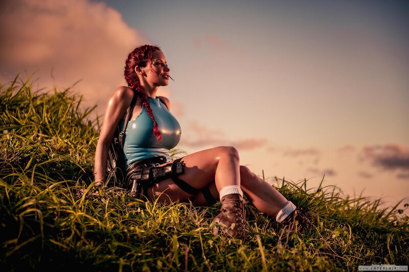 Woman in blue top on grass