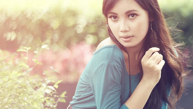 woman in blue top outdoors