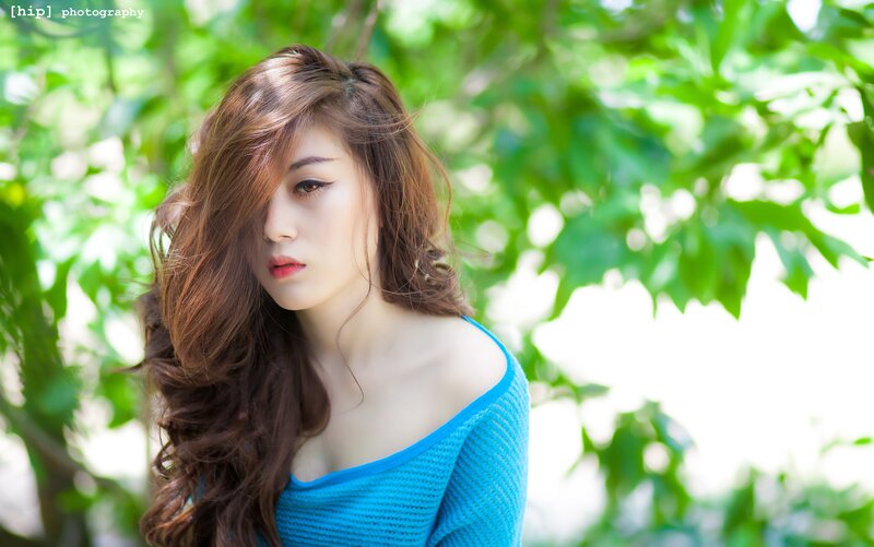 woman in blue top outdoors
