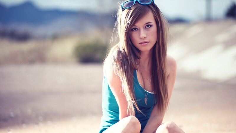woman in blue top outdoors