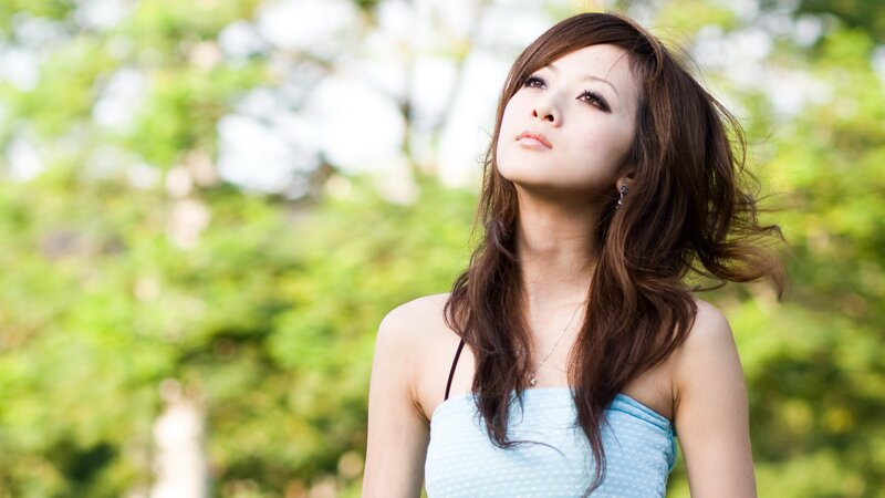 woman in blue top outdoors