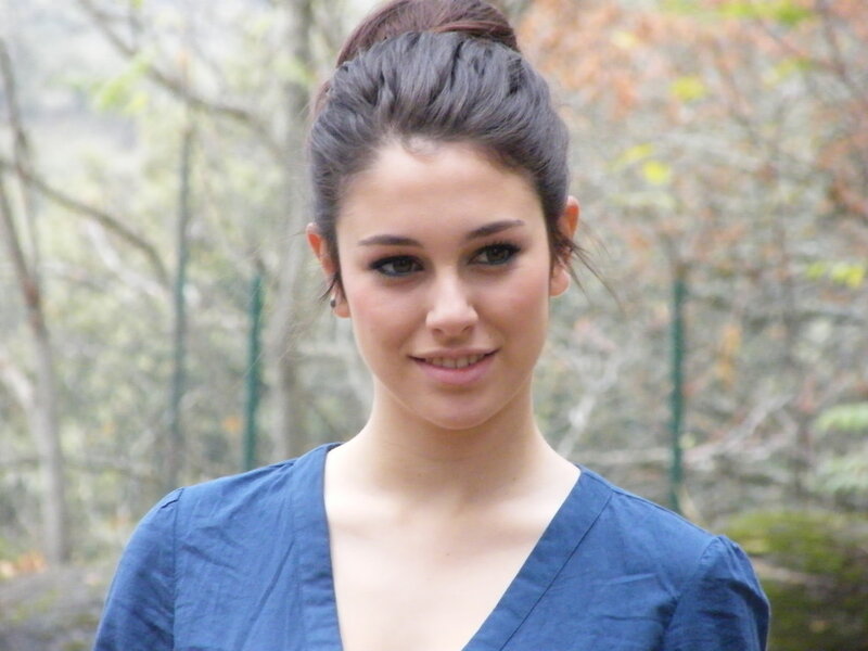 woman in blue top outdoors