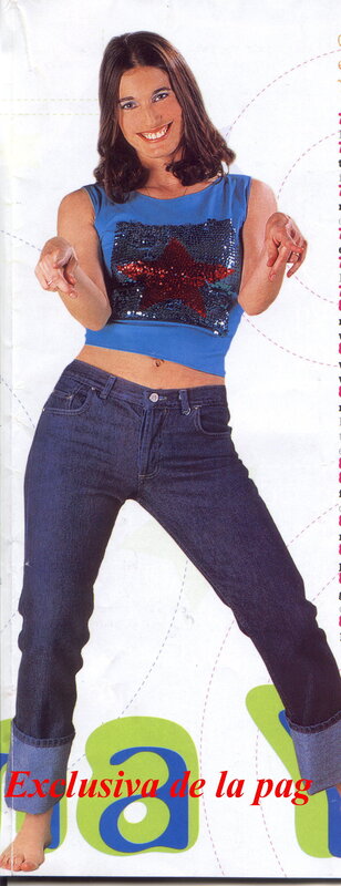 Woman in Blue Top — Playful, Photograph, Jeans