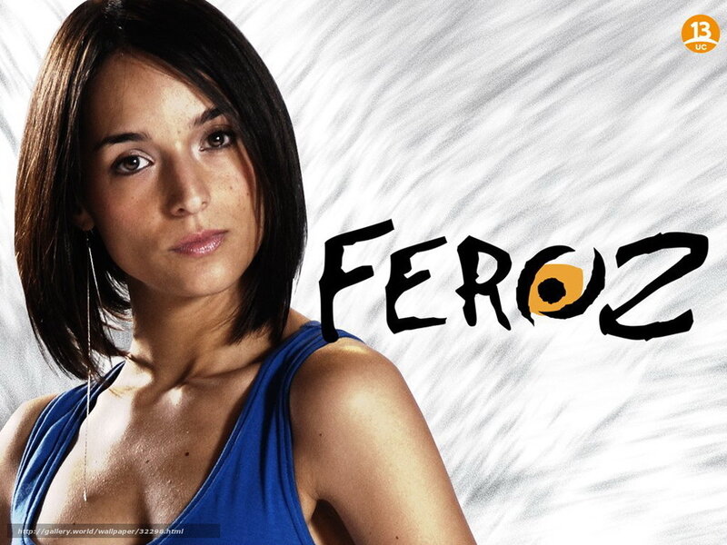 Woman in Blue Top — Serious