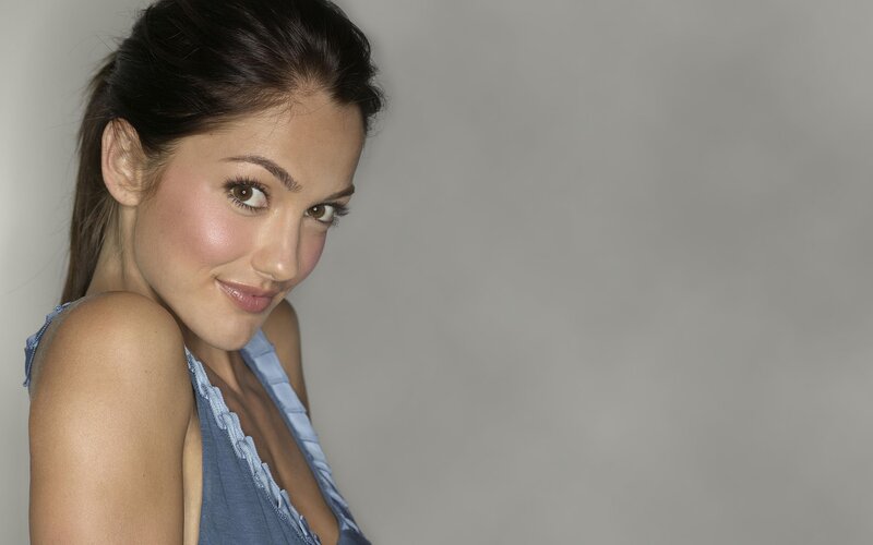 woman in blue top smiling