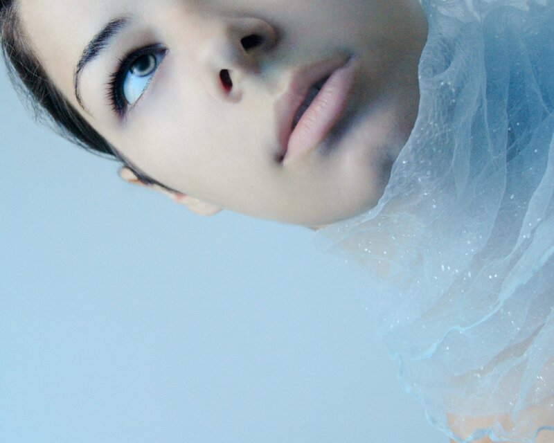 woman in blue tulle fabric