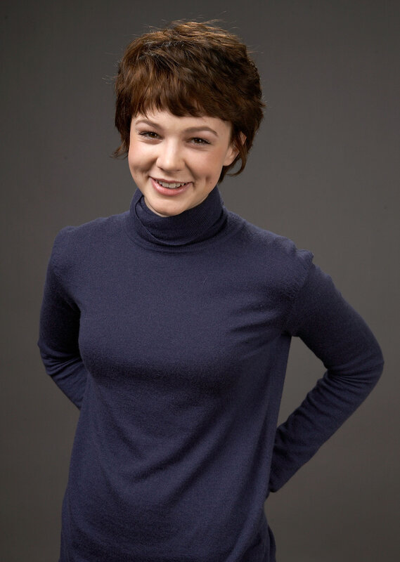 woman in blue turtleneck