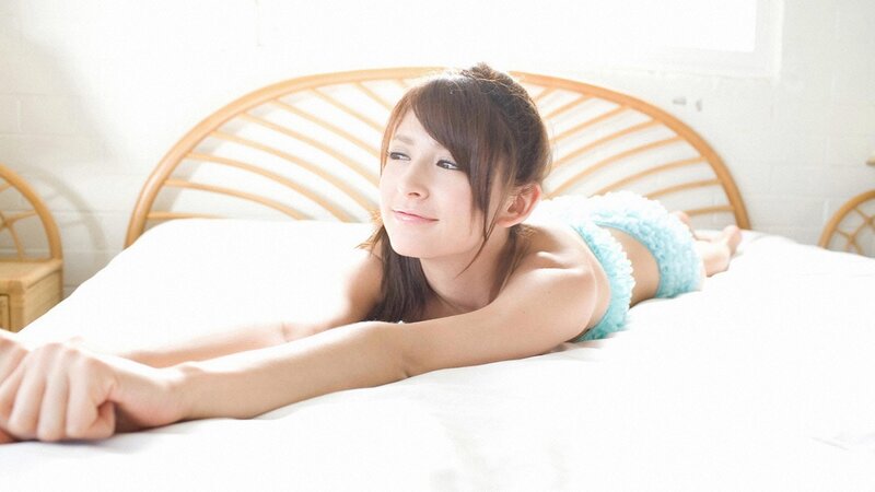woman in blue underwear on bed