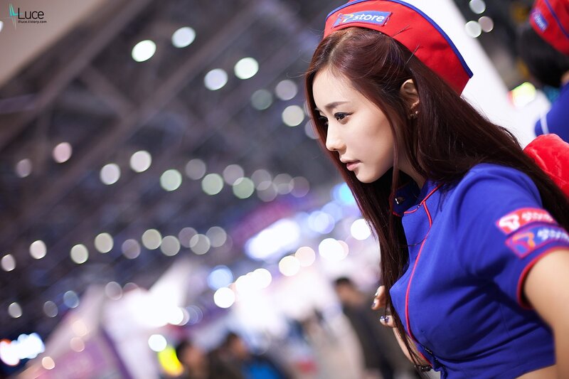 woman in blue uniform at event
