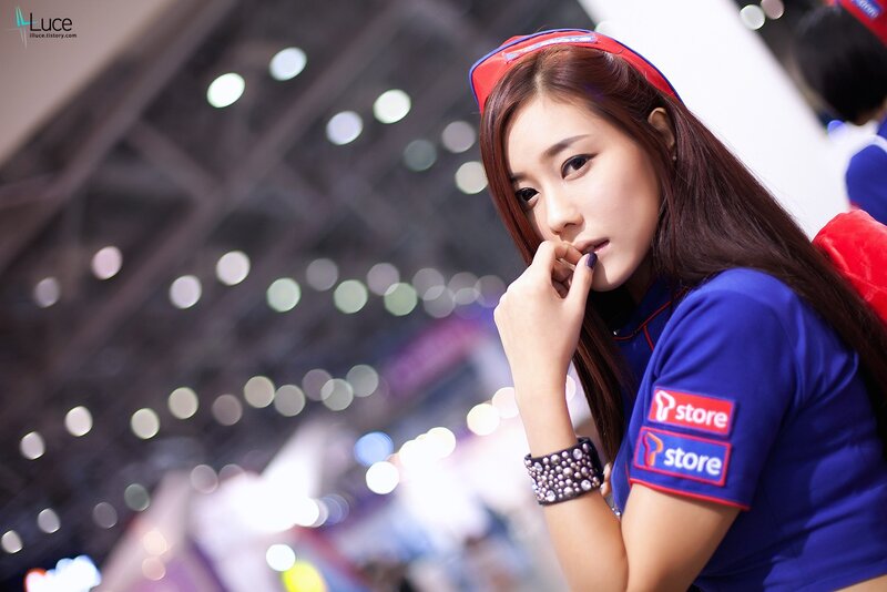 woman in blue uniform at event