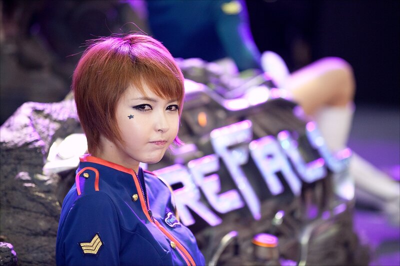woman in blue uniform at event