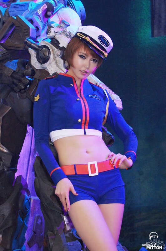 Woman in Blue Uniform — Dramatic, Photograph, Robot, Hat