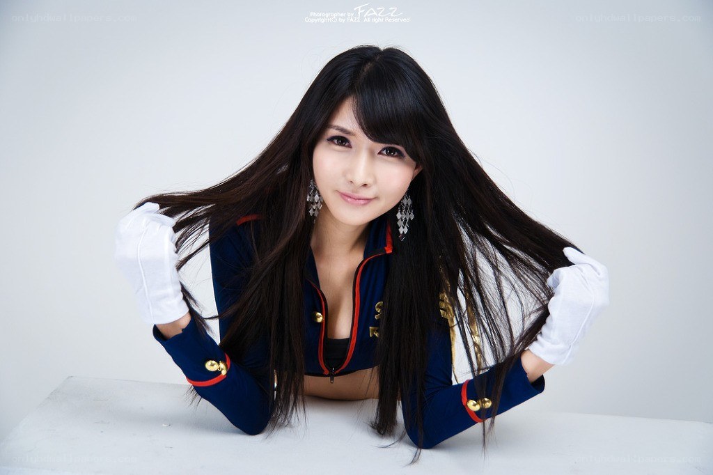 woman in blue uniform posing