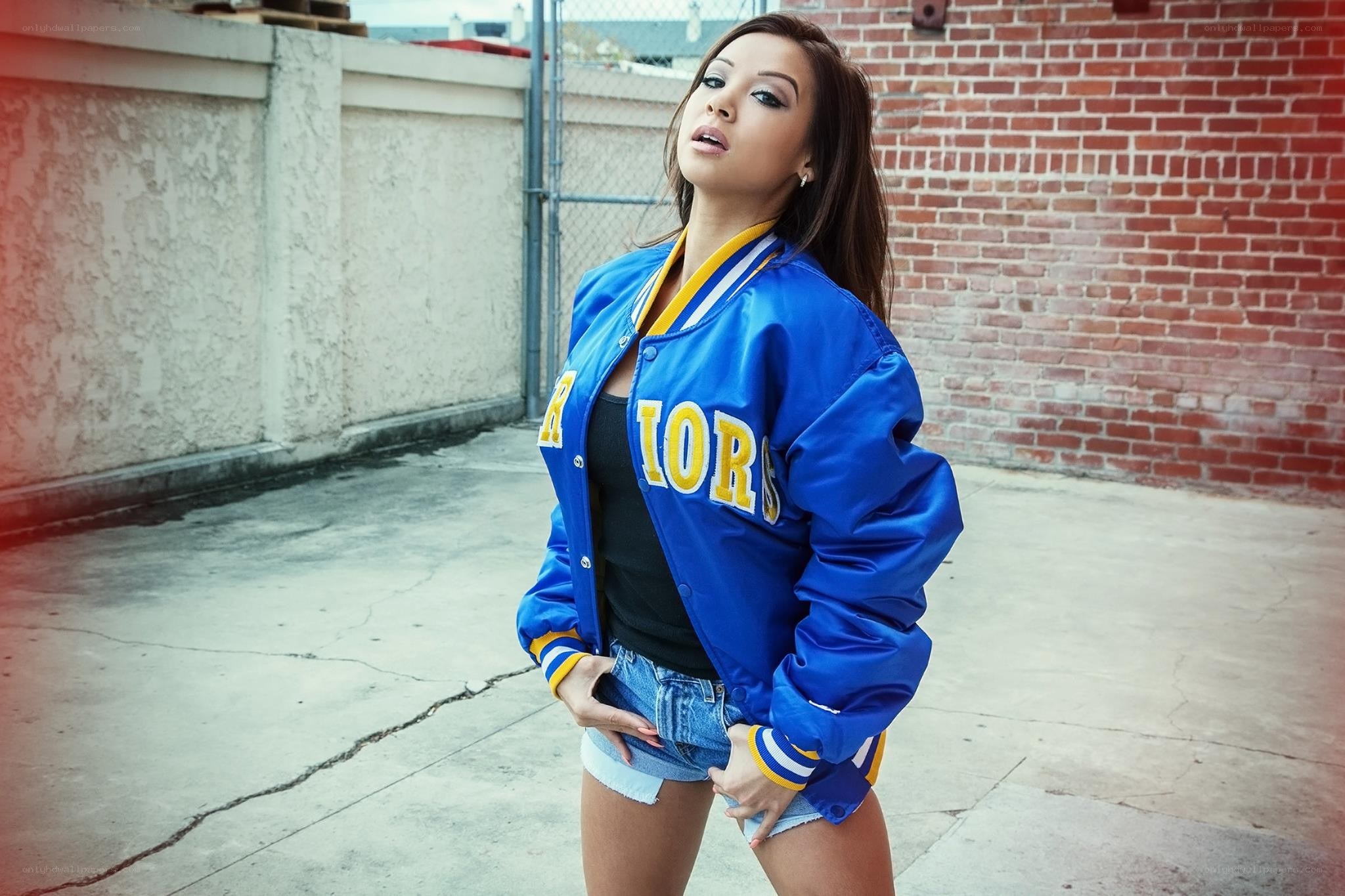 woman in blue varsity jacket