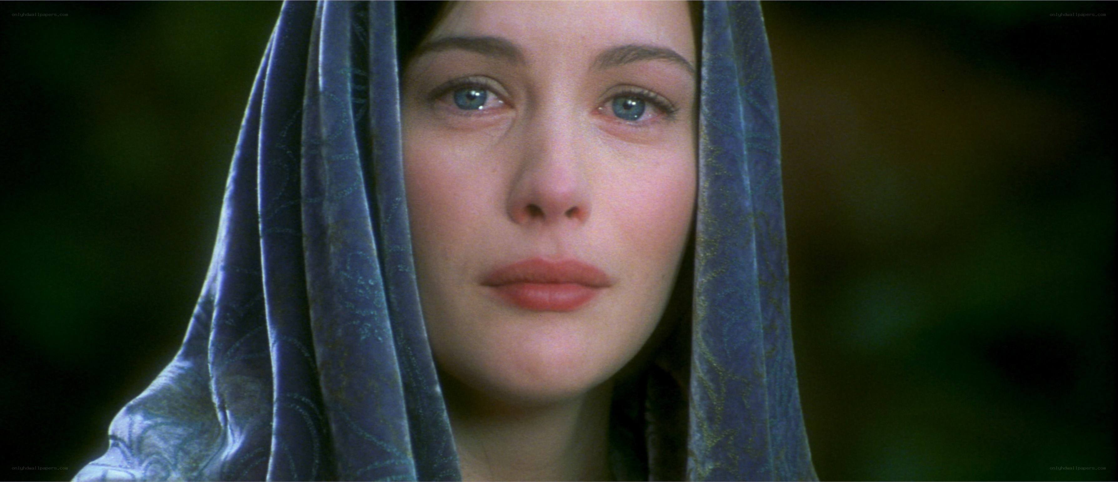 woman in blue veil