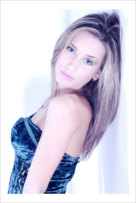 woman in blue velvet dress