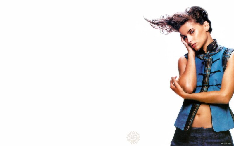 woman in blue vest