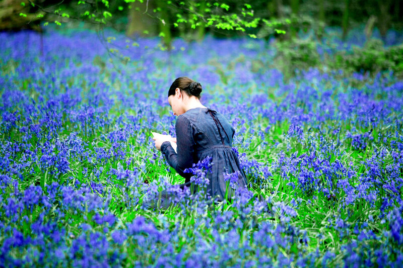 Woman in Bluebell Field