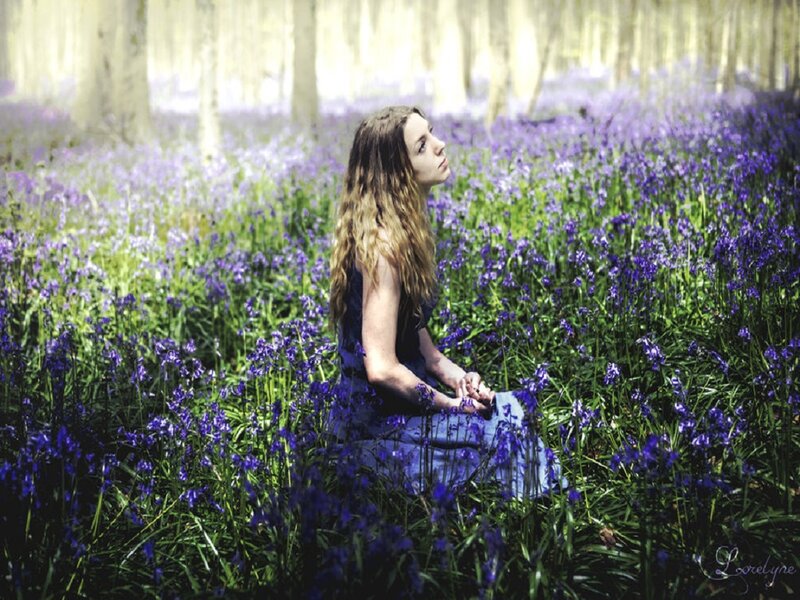 Woman in Bluebell Forest